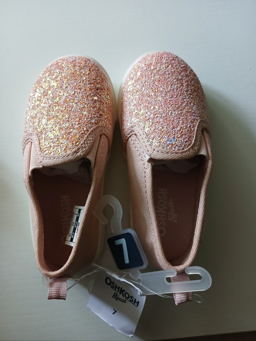 OshKosh B'gosh Glitter Slip-On Sneakers in Peach Pink
